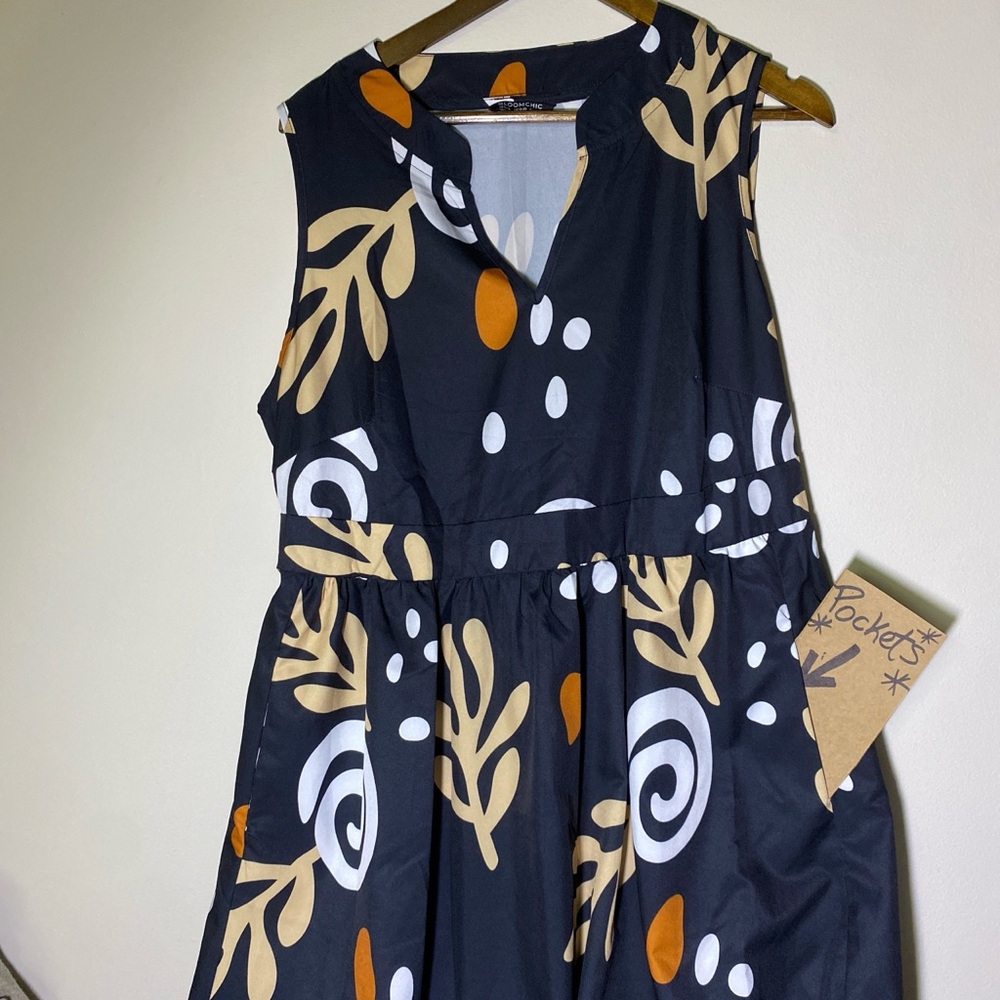 BloomChic Black Dress with Orange and White Patterns